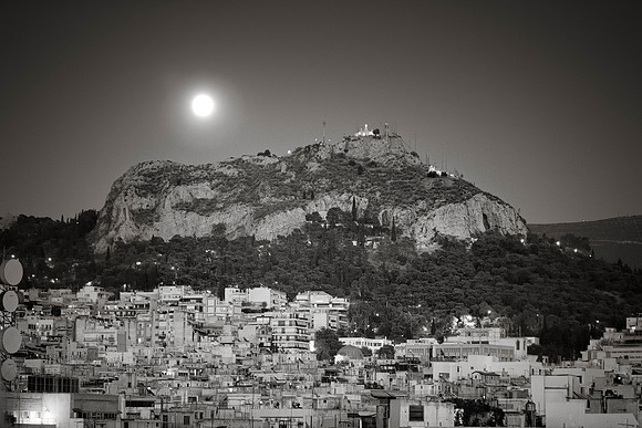 Full Moon Over Athens by Christian Del Rosario